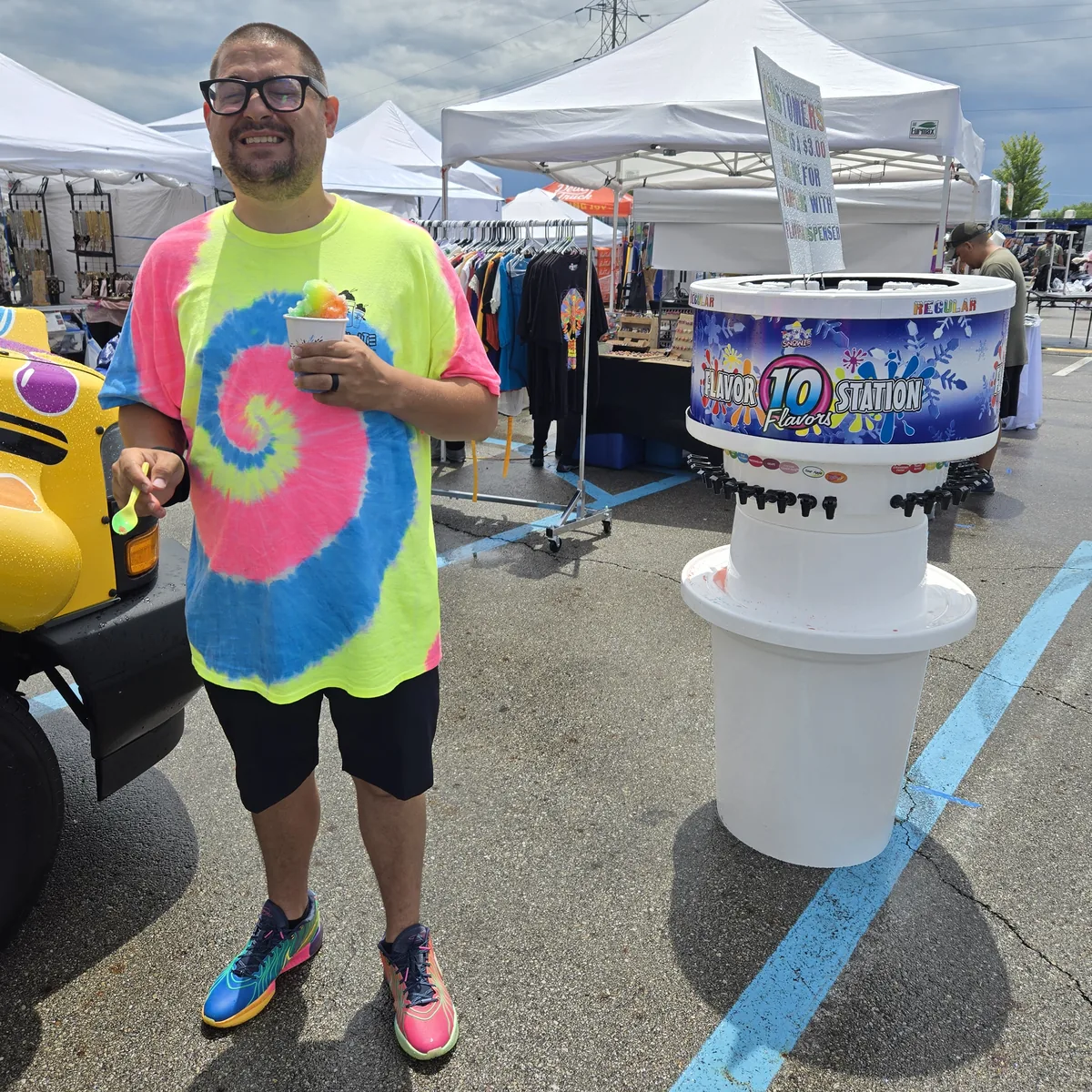 The self-serve 10-flavor Flavor Station next to the bus at an outdoor market